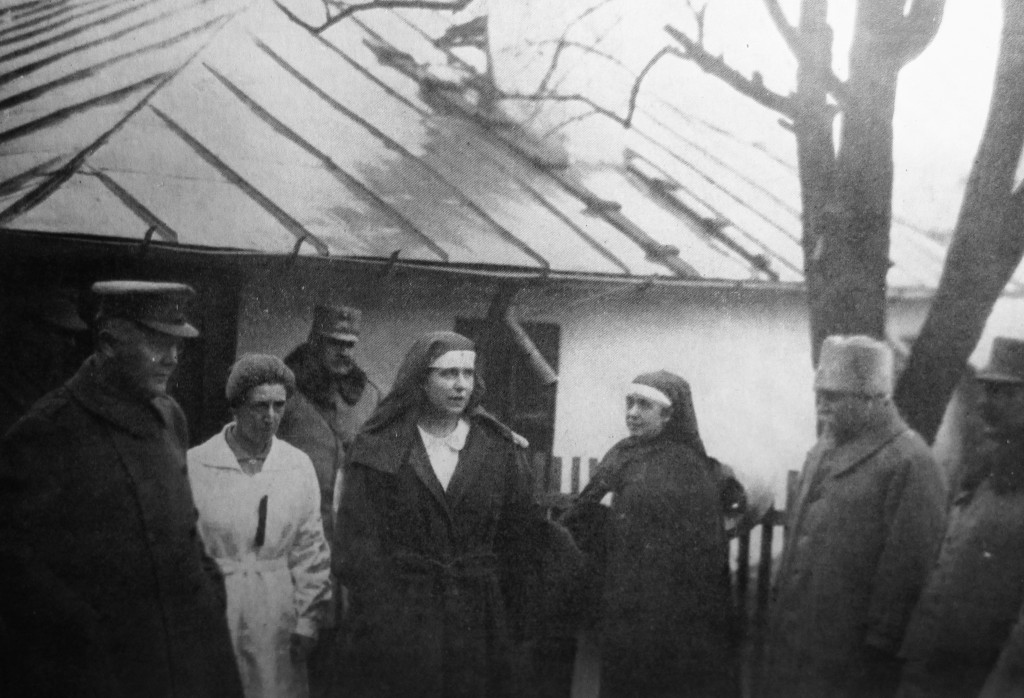 visiting poor hospitals on the front with col Anderson